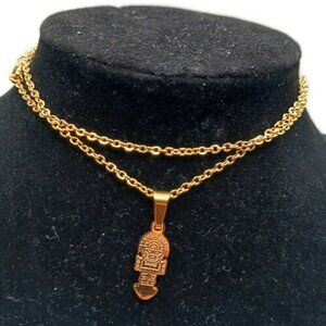 Peruvian tumi pendant 18k banado in gold